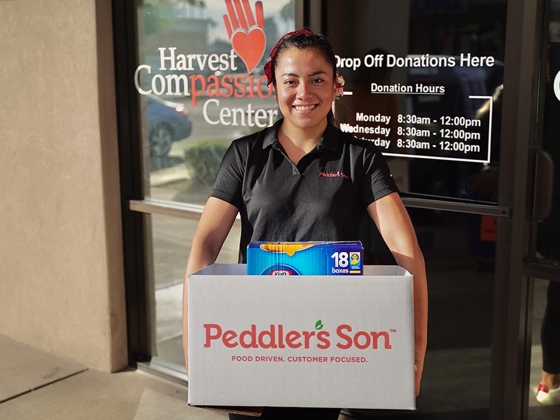 Cinthia From Peddler's Son with food to donate